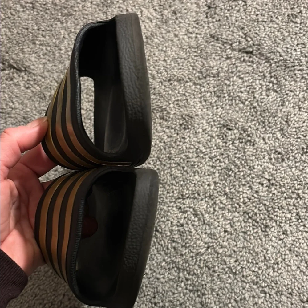adidas Black Slide Sandals with Metallic Gold Stripes